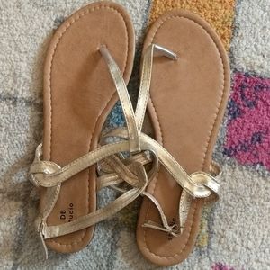 T strap sandals metallic gold